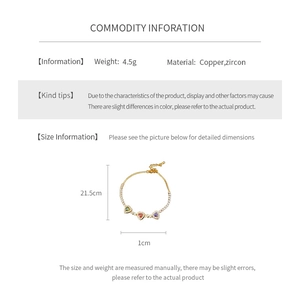 Detail of 18k gold plated copper bracelet showing three zircon heart charms and size specs