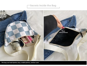 Detail showing the main pocket capacity of the checkerboard bag with daily essentials