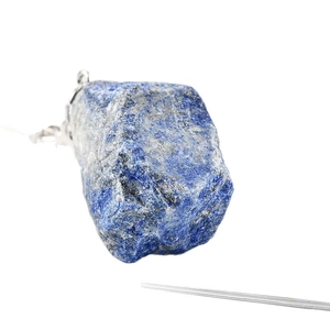 Natural raw Lapis Lazuli stone keychain pendant with silver metal ring on white background