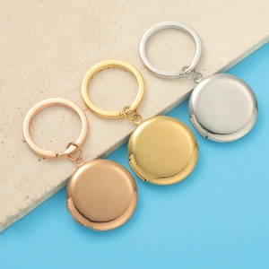 Round 316L stainless steel photo locket keychains in rose gold, gold, and silver finishes