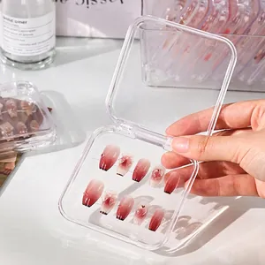 Transparent flip-top press-on nail storage box with pink 3D bow design nail art display