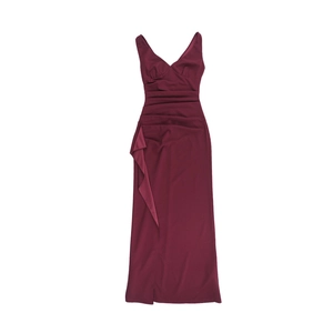 Detail of burgundy V-neck evening dress featuring pleated waist and side slit design