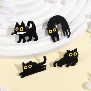 Set of 4 cute cartoon black cat enamel pins with yellow eyes on white display stand