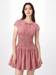Short sleeve red and white gingham smocked waist dress with hollow out tie neckline