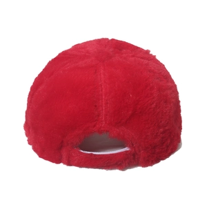 Rear view of vibrant red plush baseball cap featuring adjustable back and soft warm texture