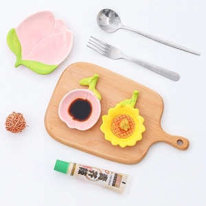 Tulip ceramic snack plates featuring pink peach and yellow sunflower floral designs