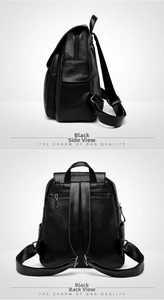 Detail view showing black litchi texture backpack with anti-theft zipper and adjustable straps