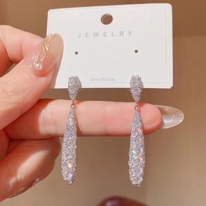 Elegant long silver teardrop earrings with sparkling rhinestones and S925 silver posts