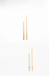 Detail view of model 969 gold aluminum quartz clock hands with standard mounting holes