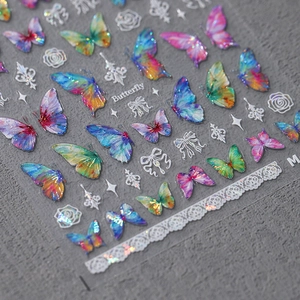 Holographic butterfly nail art stickers with 3D ribbon bows and lace designs