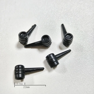 Macro detail of 22mm black plastic gingerbread man hangers with precise dimensions