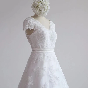 French lace wedding dress with V-neck, short sleeves and elegant A-line silhouette