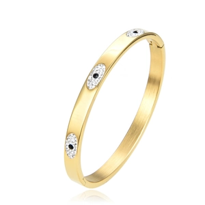 Gold evil eye bangle for women with sparkling crystal stones and polished finish