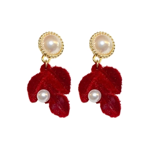 Elegant red flocked leaf tassel earrings with pearls and gold accents on white background