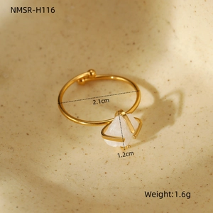 Detailed view of adjustable gold ring with white crystal and specific size measurements