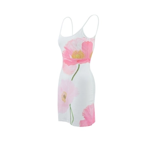 Detail view of pink floral pattern on white strap dress showing fabric texture
