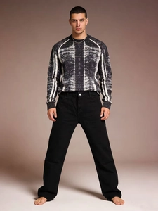 Men's knitted sweater with abstract pattern and black straight-leg casual trousers