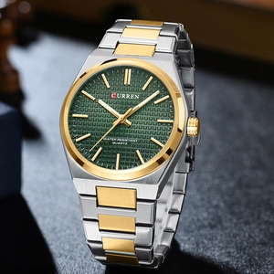Macro detail of Curren quartz watch featuring green textured dial and gold-silver strap