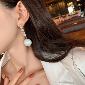 Elegant long drop earrings with shiny crystals and white pearls for women