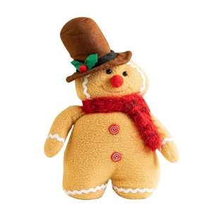 Plush gingerbread man Christmas gnome with a brown top hat and red winter scarf