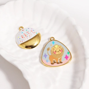 Detail view of colorful enamel stainless steel pendants with lion and star patterns