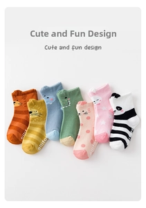 Set of seven colorful cartoon animal baby socks with non-slip grips and cute patterns
