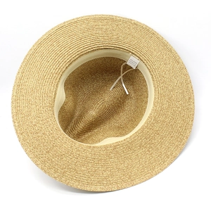 Detail of Panama hat interior featuring 100% paper tag and adjustable sweatband