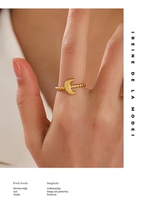 Close-up of 18K gold-plated stainless steel moon ring with beaded band texture