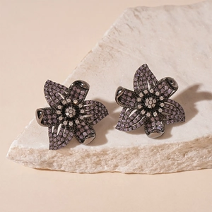 Vintage floral zircon stud earrings in gunmetal finish with purple and white stones