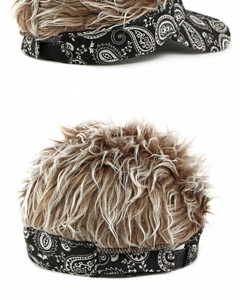 Detail view of ethnic paisley sun visor with realistic short synthetic hair wig and adjustable strap