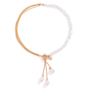 Asymmetric gold chain necklace with irregular pearls and elegant tassel pendants