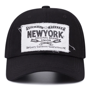 Classic black cotton baseball cap with vintage NEW YORK patch and distressed white edges