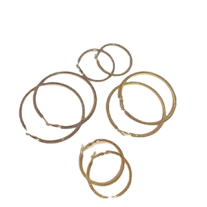 Sparkling gold hoop earrings set in various sizes featuring fine rhinestone embellishments