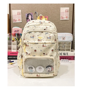 Detail of cream-colored backpack with dachshund print and transparent pocket for pins