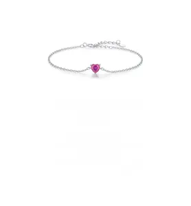 Macro detail of silver heart bracelet featuring pink gemstone and adjustable chain link