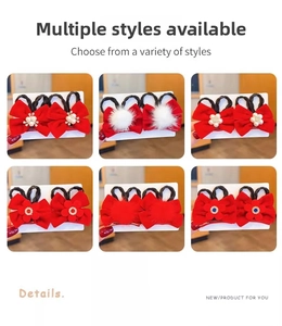 Detail view of red bow hair clips with pearls, rhinestones and faux fur balls