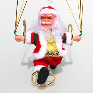 Detail of hanging Santa Claus figurine with red velvet suit and gold hanging thread