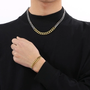Two-tone gold and silver Cuban link chain necklace and bracelet set for men