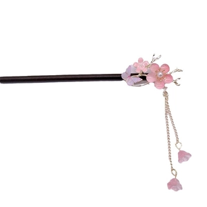 Traditional wooden hairpin with pink flower petals and elegant long fringe tassels
