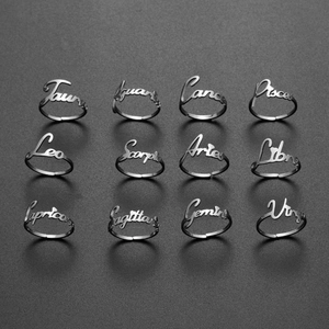 Set of 12 stainless steel zodiac sign rings with adjustable open band for women