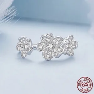 Elegant S925 sterling silver flower ring set with sparkling white zircon stones