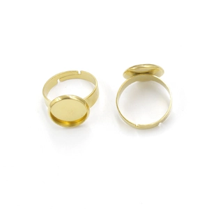 Close-up of golden adjustable ring bases with 12mm round trays for DIY jewelry making