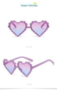 Detail of purple glitter heart sunglasses with pink to blue gradient lenses and side view