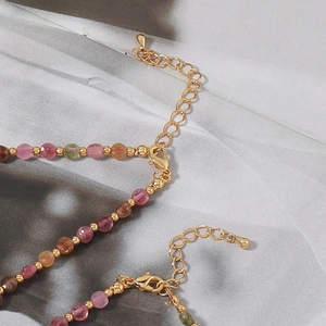 Handmade necklace with colorful natural tourmaline beads and golden lobster clasp