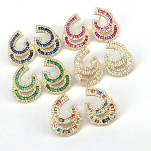 Detailed set of five gold plated C-shaped earrings with colorful sparkling cubic zirconia