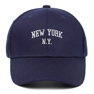 Dark blue baseball cap with white New York embroidery in a 45-degree angle view