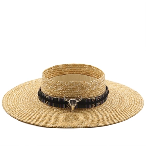 Fashionable straw sun hat with wide brim, ethnic band and vintage silver bull head ornament