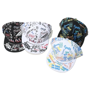Top view of flat brim hip-hop hats featuring diverse black and white graffiti patterns