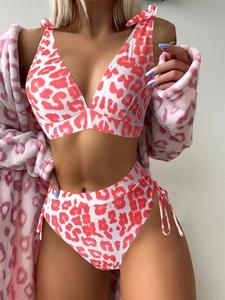 Detail of high waisted bikini with pink leopard print and textured ribbed fabric