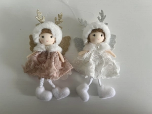Close-up of pink and white plush angel reindeer Christmas tree hanging ornaments